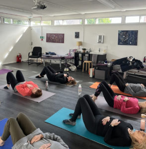 Group Workshop - group laying on yoga mats